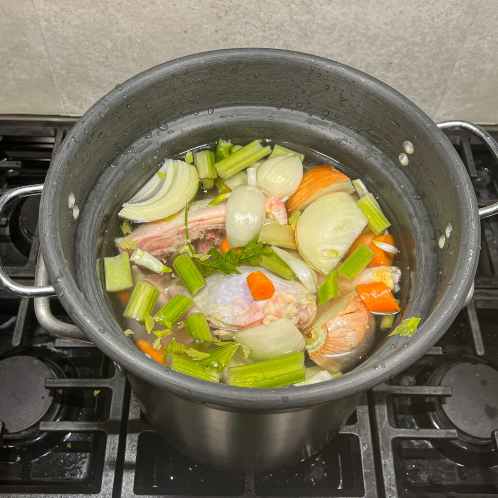 Chicken stock on the stove
